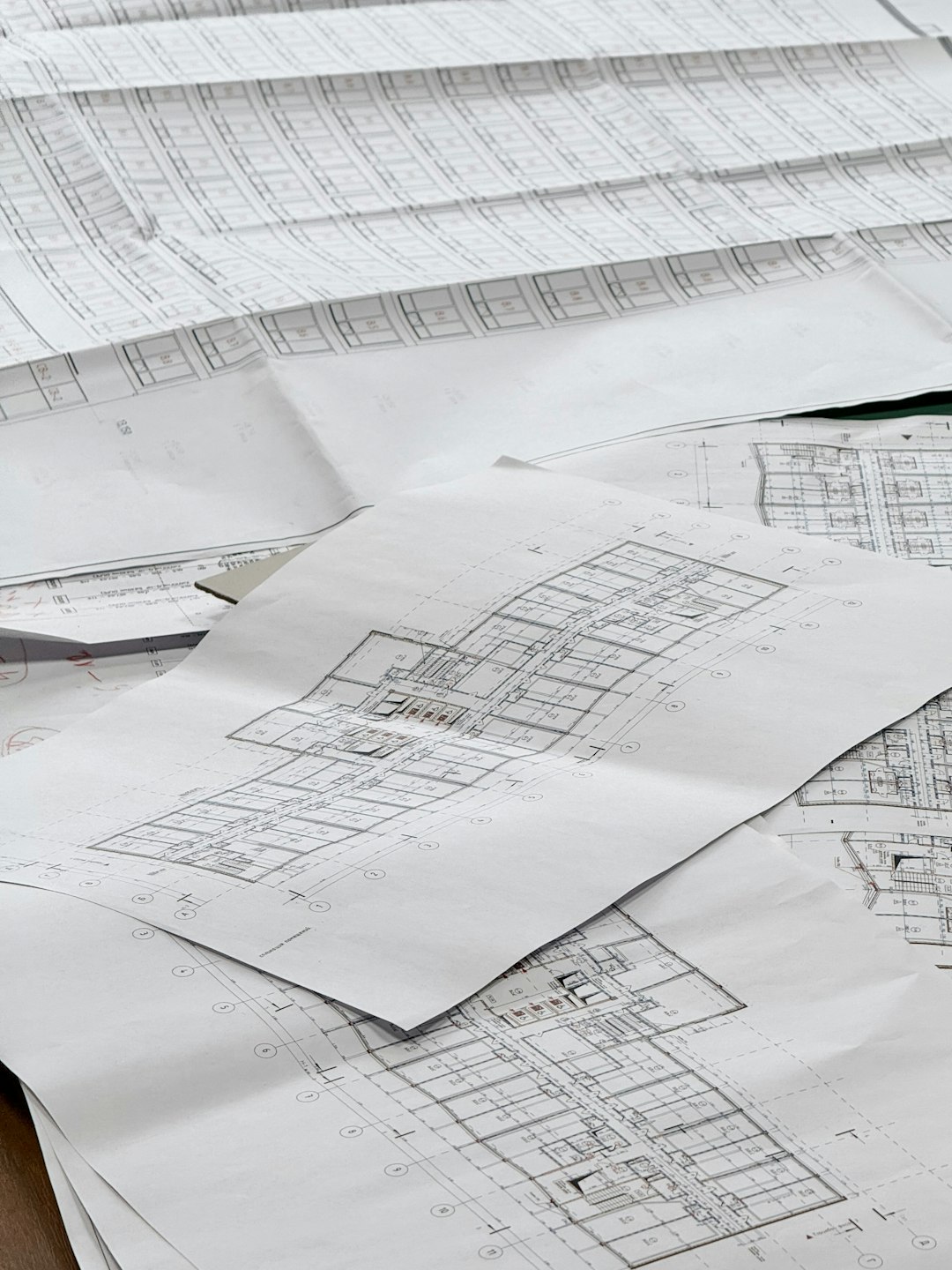 Engineering blueprints laid out on a table